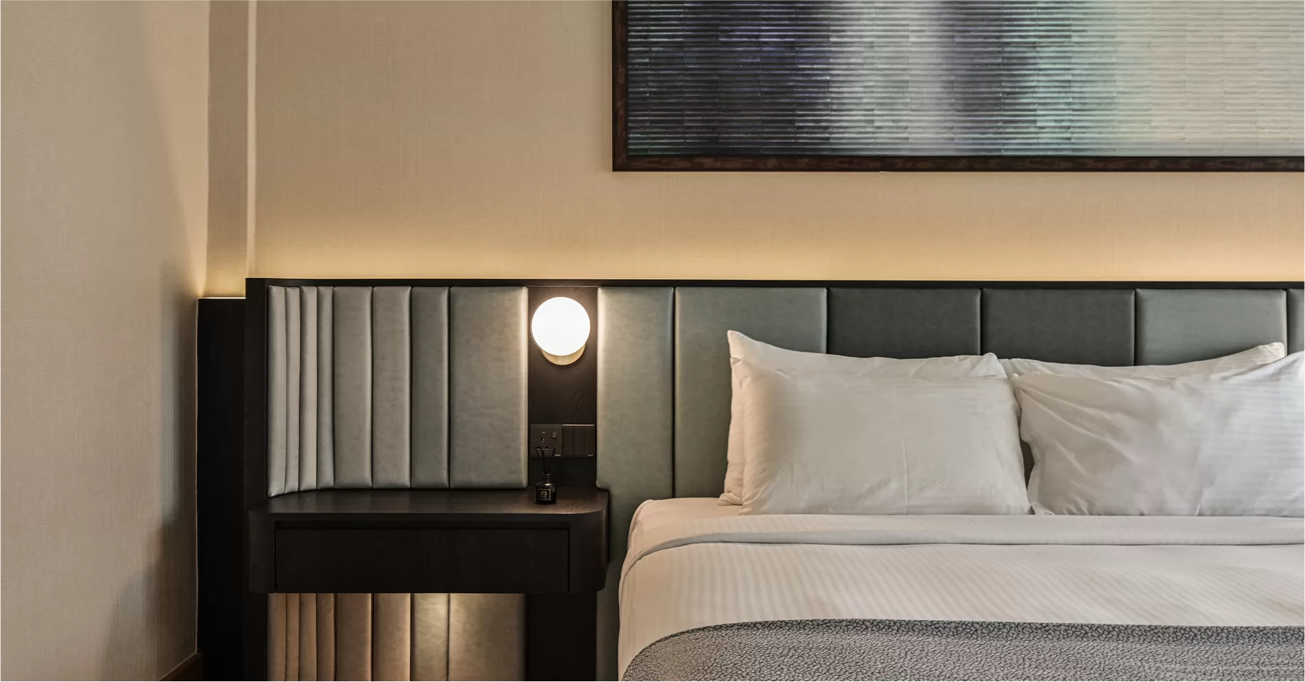 Sebana Cove Resort guest room designed by Homlux Sebana Cove Resort guest room designed by Homlux, featuring luxurious bedding, an open wardrobe, and a welcoming, functional layout